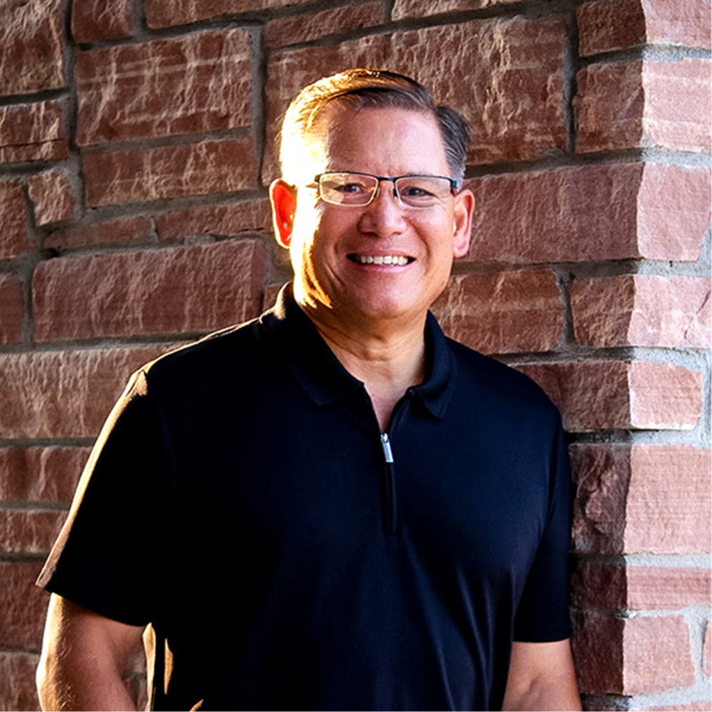 A professional headshot of dr. Thomas Michalik